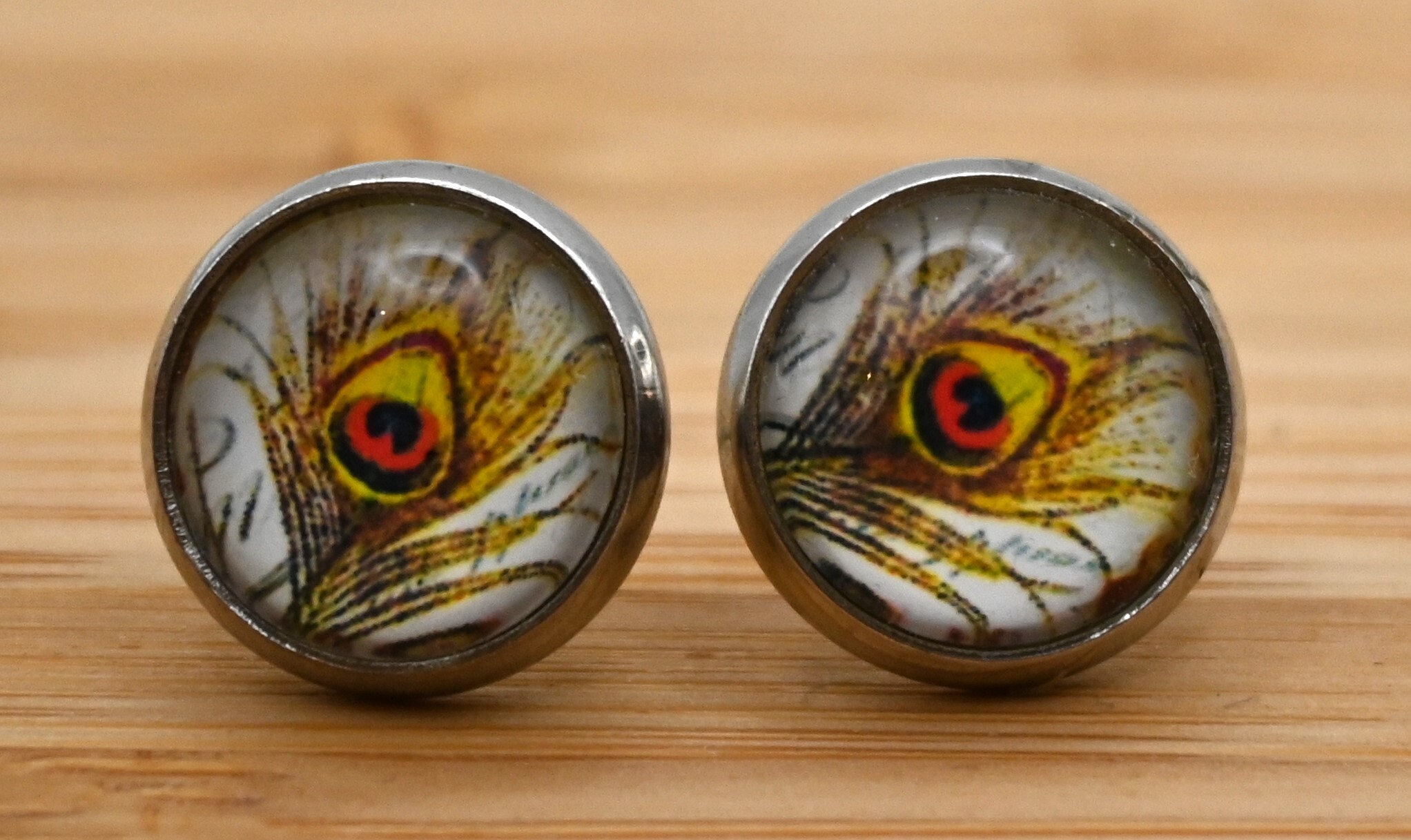 Oorbellen stekertje Pauwenveer geel